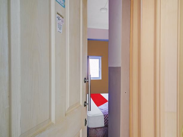Imagen de la habitación del Hotel Oyo 90499 Fortune. Foto 3