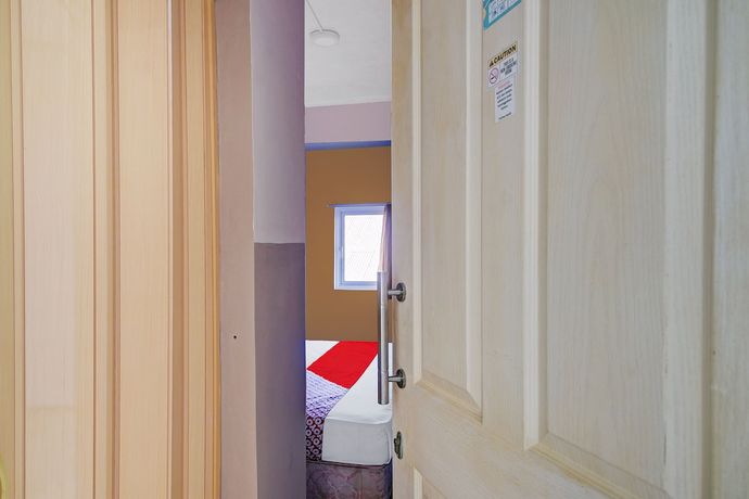 Imagen de la habitación del Hotel Oyo 90499 Fortune. Foto 5