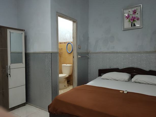 Imagen de la habitación del Hotel Oyo 90529 Baruga Makassar. Foto 5