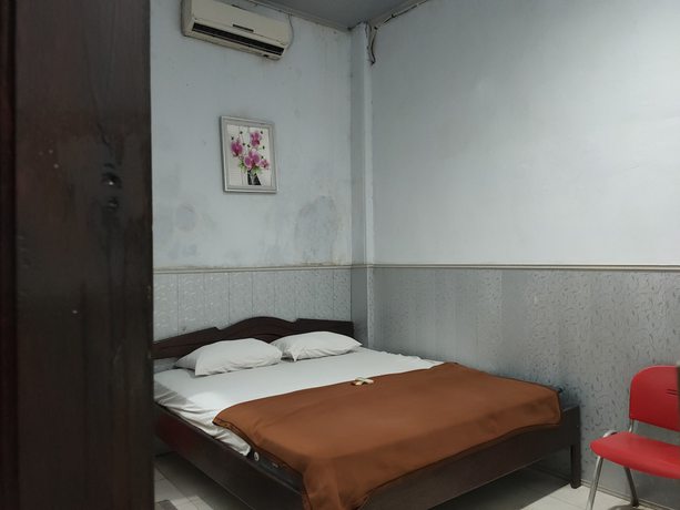 Imagen de la habitación del Hotel Oyo 90529 Baruga Makassar. Foto 6