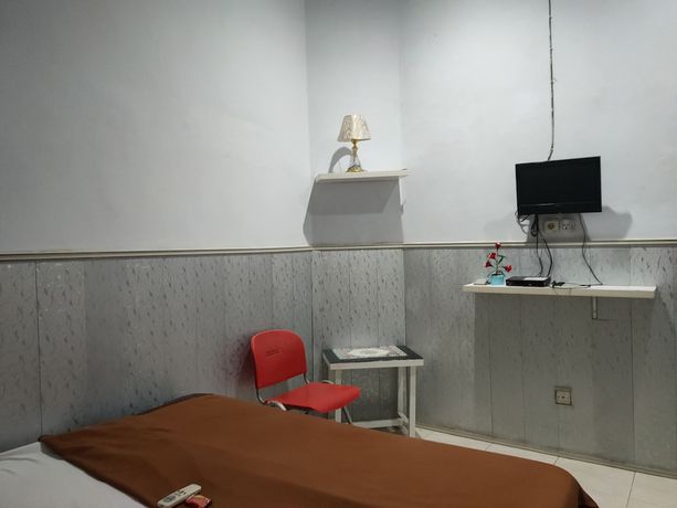 Imagen de la habitación del Hotel Oyo 90529 Baruga Makassar. Foto 7