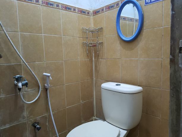 Imagen de la habitación del Hotel Oyo 90529 Baruga Makassar. Foto 8