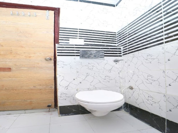 Imagen de la habitación del Hotel Oyo 9055 Rich Inn. Foto 17
