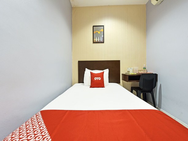 Imagen de la habitación del Hotel Oyo 90644 M Three. Foto 2
