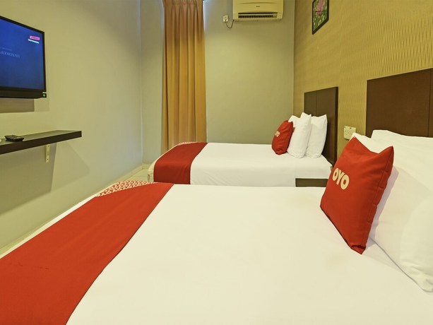 Imagen de la habitación del Hotel Oyo 90644 M Three. Foto 3