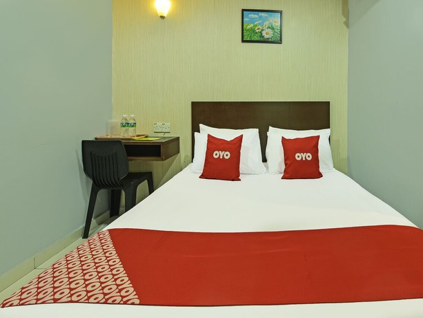 Imagen de la habitación del Hotel Oyo 90644 M Three. Foto 6