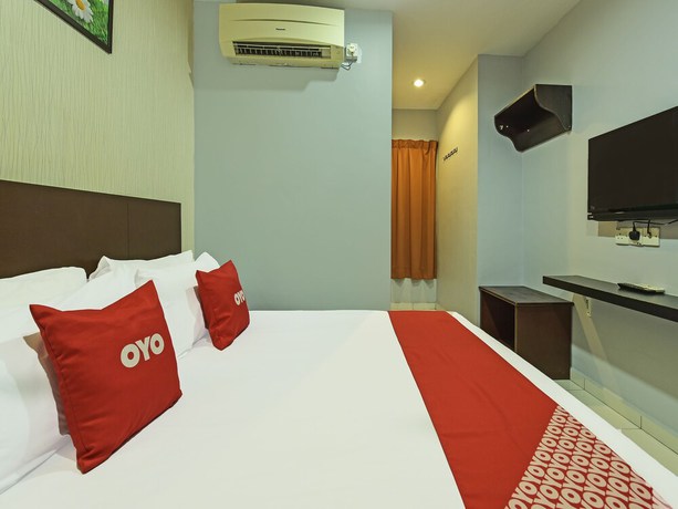 Imagen de la habitación del Hotel Oyo 90644 M Three. Foto 9