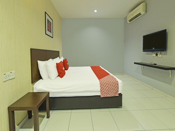 Imagen de la habitación del Hotel Oyo 90644 M Three. Foto 10