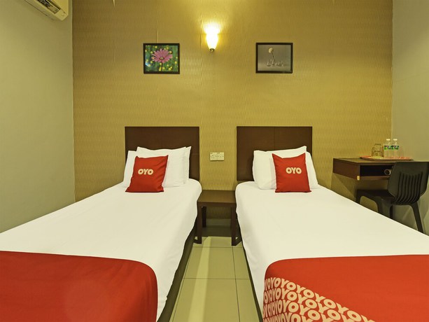 Imagen de la habitación del Hotel Oyo 90644 M Three. Foto 12
