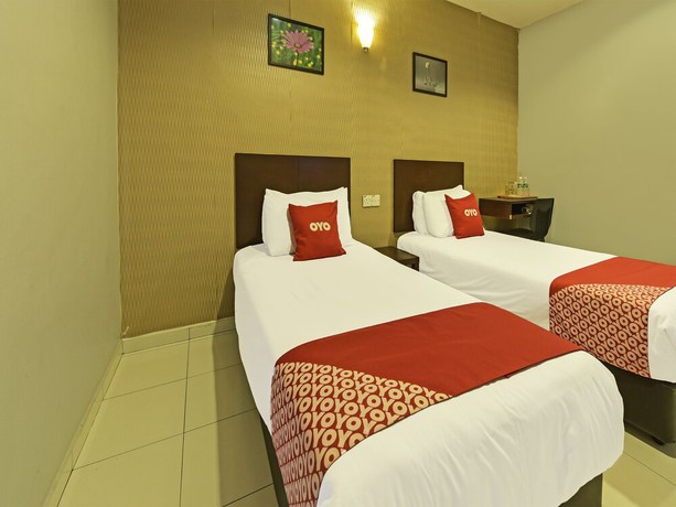 Imagen de la habitación del Hotel Oyo 90644 M Three. Foto 16