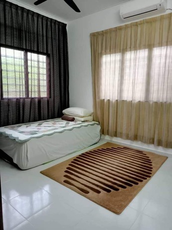 Imagen de la habitación del Hotel Oyo 90692 Tok Babah Village Homestay. Foto 6
