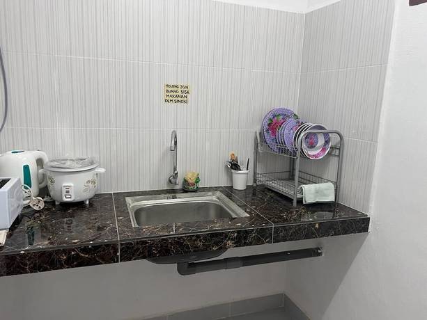 Imagen de la habitación del Hotel Oyo 90692 Tok Babah Village Homestay. Foto 9