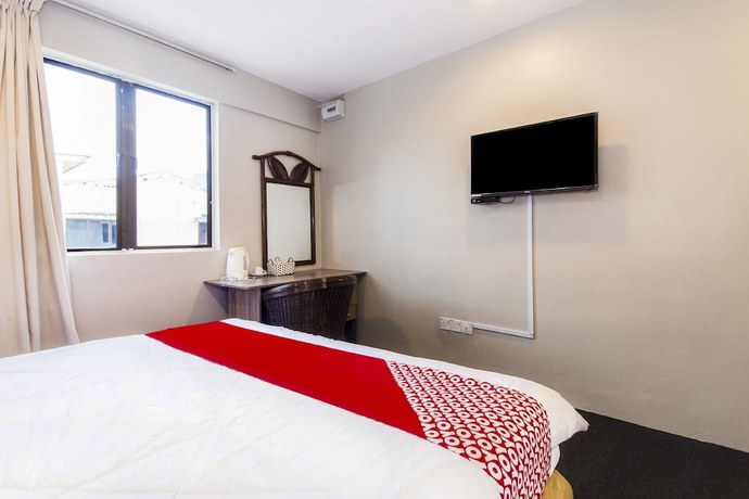 Imagen de la habitación del Hotel Oyo 90693 Sri Rampai. Foto 2