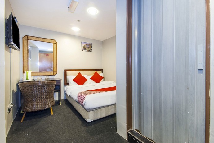 Imagen de la habitación del Hotel Oyo 90693 Sri Rampai. Foto 4
