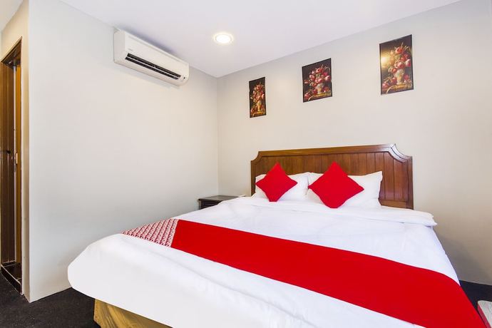 Imagen de la habitación del Hotel Oyo 90693 Sri Rampai. Foto 5