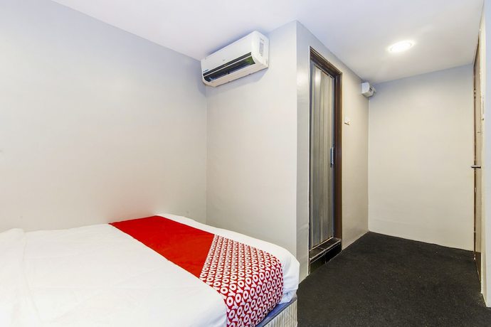 Imagen de la habitación del Hotel Oyo 90693 Sri Rampai. Foto 7