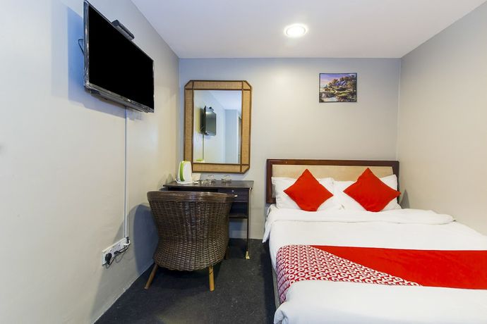 Imagen de la habitación del Hotel Oyo 90693 Sri Rampai. Foto 11
