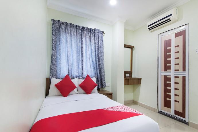 Imagen de la habitación del Hotel Oyo 90693 Sri Rampai. Foto 17