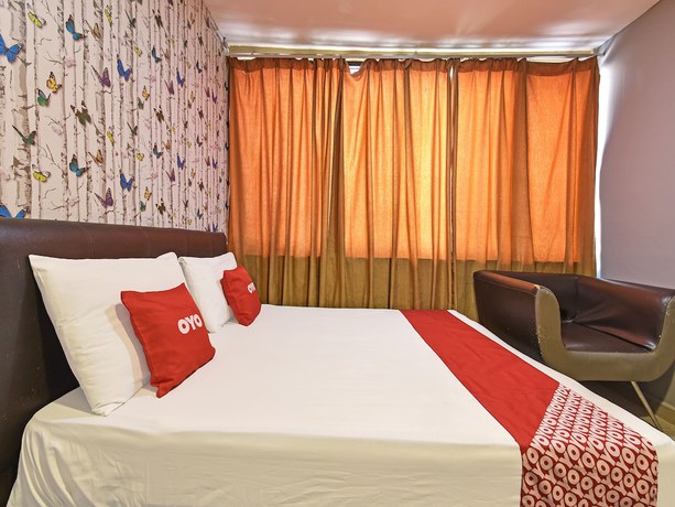 Imagen de la habitación del Hotel Oyo 90703 Rim Global. Foto 2