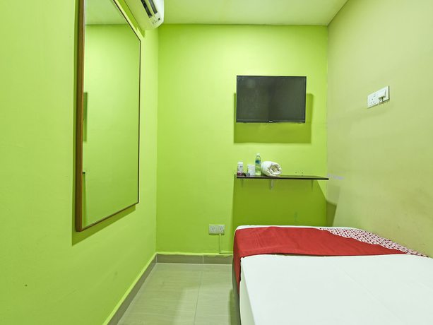 Imagen de la habitación del Hotel Oyo 90703 Rim Global. Foto 5