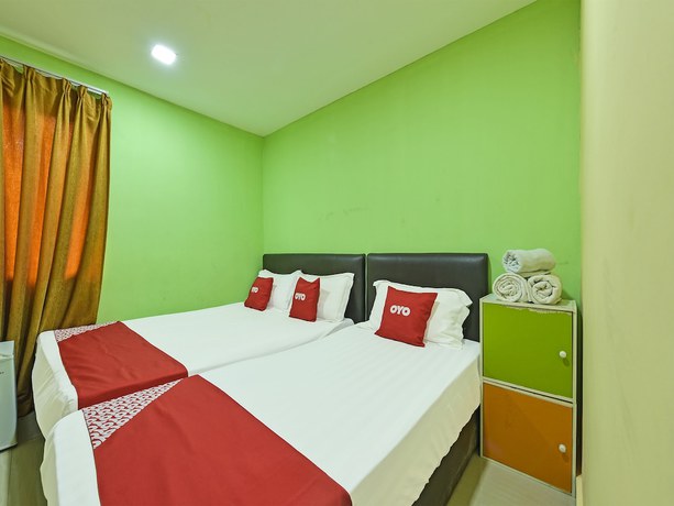 Imagen de la habitación del Hotel Oyo 90703 Rim Global. Foto 6