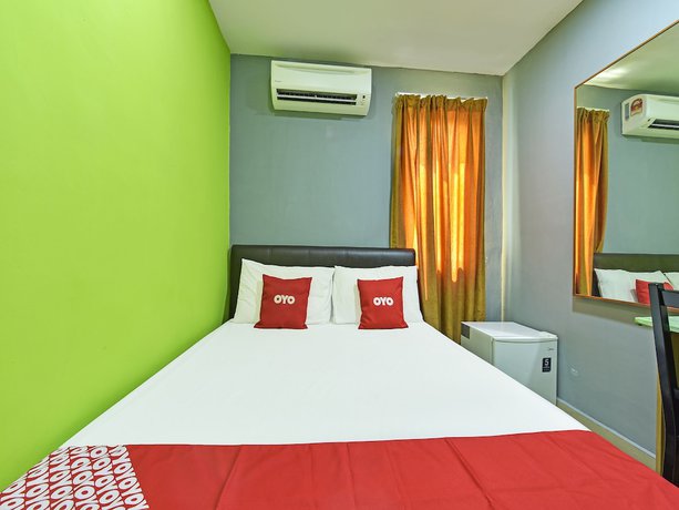Imagen de la habitación del Hotel Oyo 90703 Rim Global. Foto 8