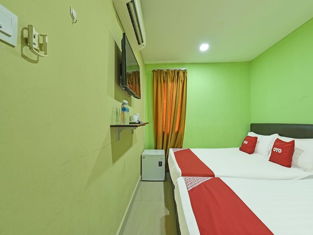 Imagen de la habitación del Hotel Oyo 90703 Rim Global. Foto 9