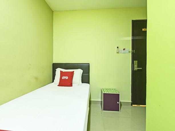 Imagen de la habitación del Hotel Oyo 90703 Rim Global. Foto 10