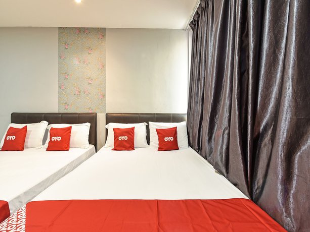Imagen de la habitación del Hotel Oyo 90703 Rim Global. Foto 11