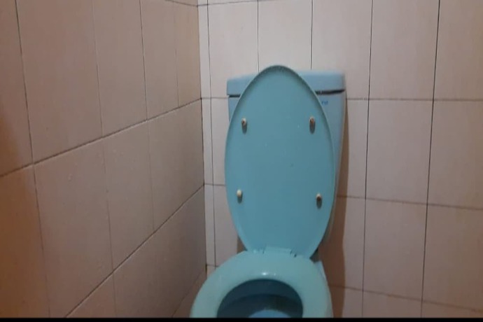 Imagen de la habitación del Hotel Oyo 90706 Kost Alam Jaya Syariah. Foto 2