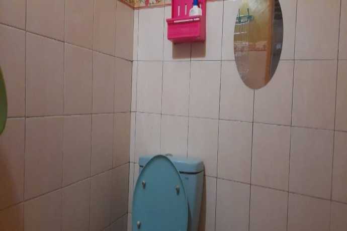 Imagen de la habitación del Hotel Oyo 90706 Kost Alam Jaya Syariah. Foto 3