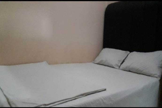 Imagen de la habitación del Hotel Oyo 90706 Kost Alam Jaya Syariah. Foto 4