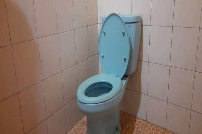 Imagen de la habitación del Hotel Oyo 90706 Kost Alam Jaya Syariah. Foto 5