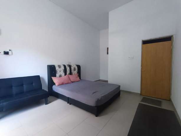 Imagen de la habitación del Hotel Oyo 90799 Sharhan Residence. Foto 5