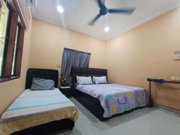 Imagen de la habitación del Hotel Oyo 90799 Sharhan Residence. Foto 7