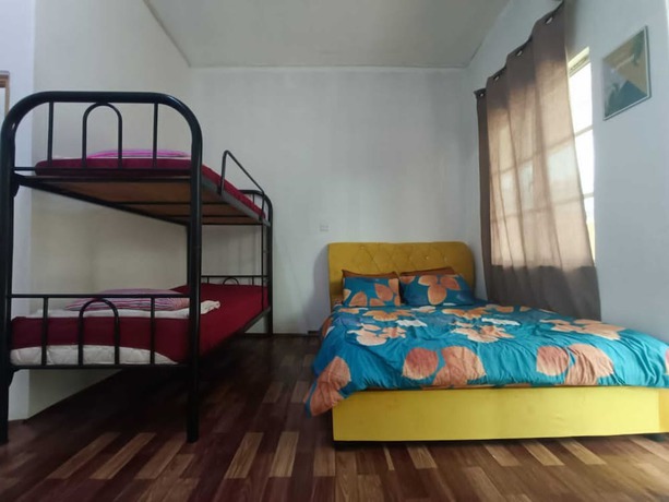 Imagen de la habitación del Hotel Oyo 90799 Sharhan Residence. Foto 9