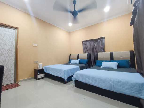 Imagen de la habitación del Hotel Oyo 90799 Sharhan Residence. Foto 10