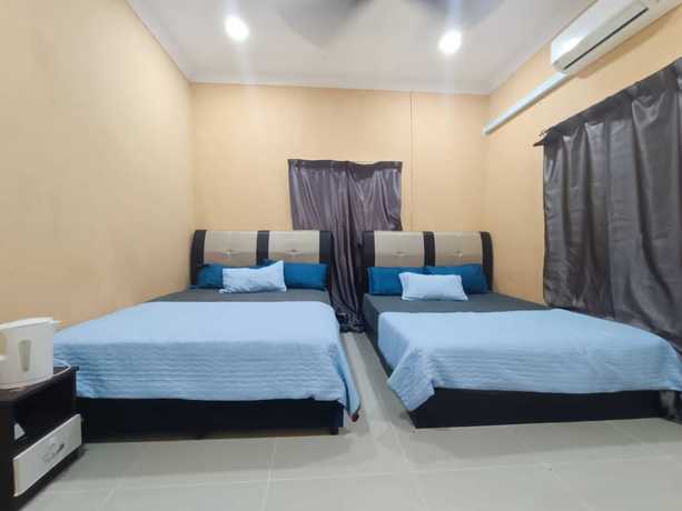 Imagen de la habitación del Hotel Oyo 90799 Sharhan Residence. Foto 15