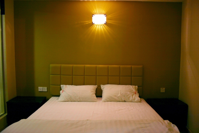 Imagen de la habitación del Hotel Oyo 90865 De Nice Inn. Foto 3