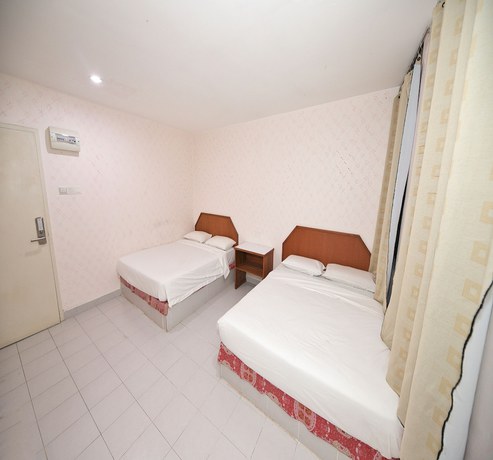 Imagen de la habitación del Hotel Oyo 90902 Desa Murni. Foto 3