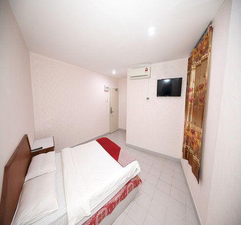 Imagen de la habitación del Hotel Oyo 90902 Desa Murni. Foto 5