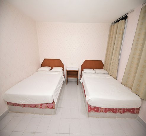 Imagen de la habitación del Hotel Oyo 90902 Desa Murni. Foto 12