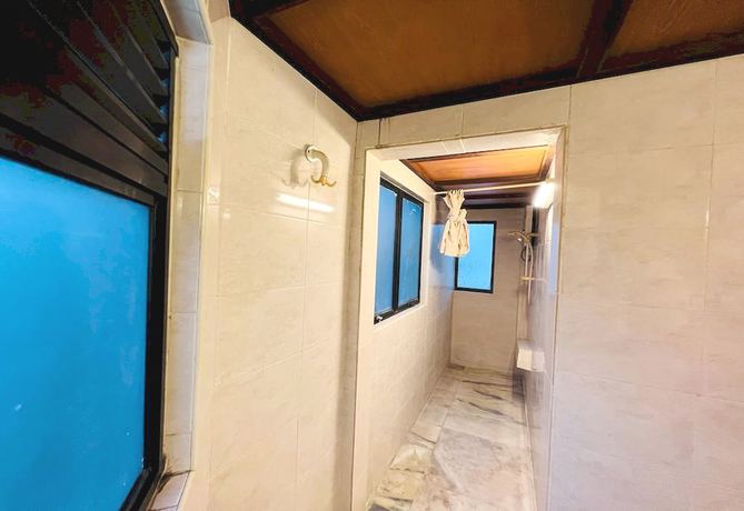 Imagen de la habitación del Hotel Oyo 90909 I.villa Inn. Foto 2