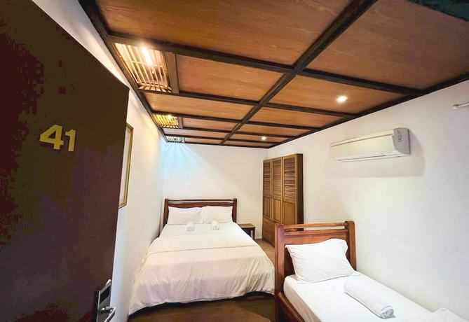 Imagen de la habitación del Hotel Oyo 90909 I.villa Inn. Foto 3