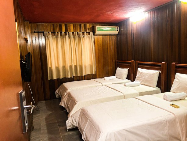Imagen de la habitación del Hotel Oyo 90909 I.villa Inn. Foto 8