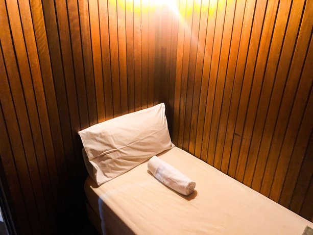 Imagen de la habitación del Hotel Oyo 90909 I.villa Inn. Foto 10