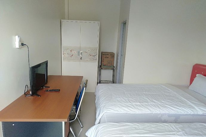 Imagen de la habitación del Hotel Oyo 90930 Wisma Hana Hani. Foto 8