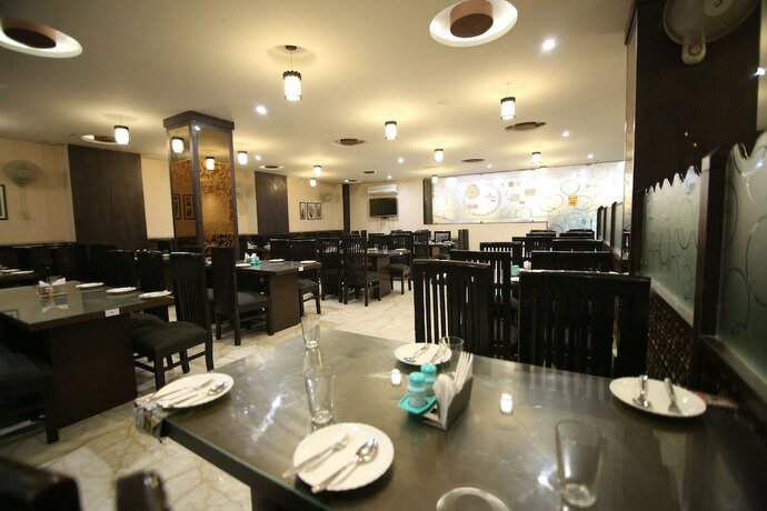 Imagen del bar/restaurante del Hotel Oyo 9096 City Star. Foto 2