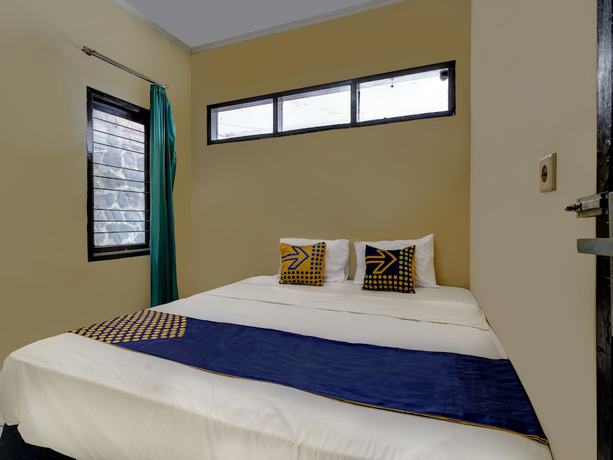 Imagen de la habitación del Hotel Oyo 91116 Pelangi Residence Syariah. Foto 2