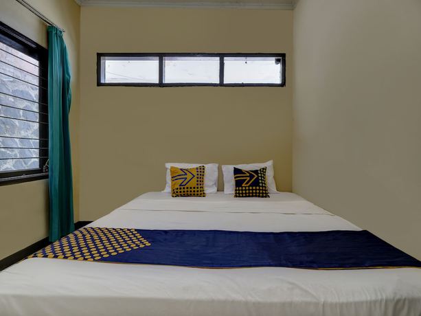 Imagen de la habitación del Hotel Oyo 91116 Pelangi Residence Syariah. Foto 4